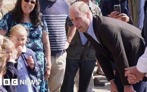 Prince William during a visit to Fistrall Beach in Newquay